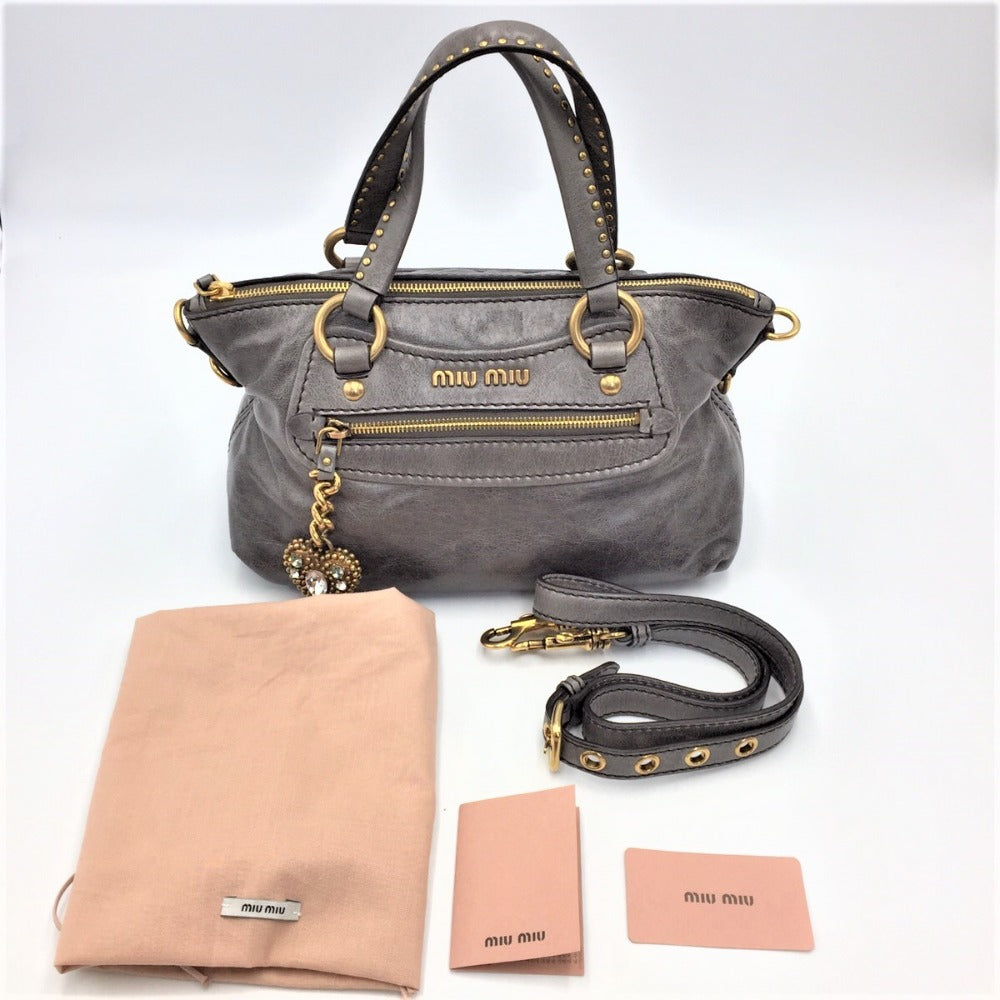 ミュウ ミュウ ショルダーバッグ miu miu 2wayショルダーバッグ ハートチャーム付き グレー ヴィンテージ加工 RN0728 RN0728 美品